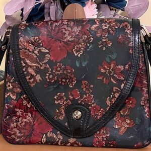 Patricia Nash Black Floral Crossbody Bag with Red and Green Accents